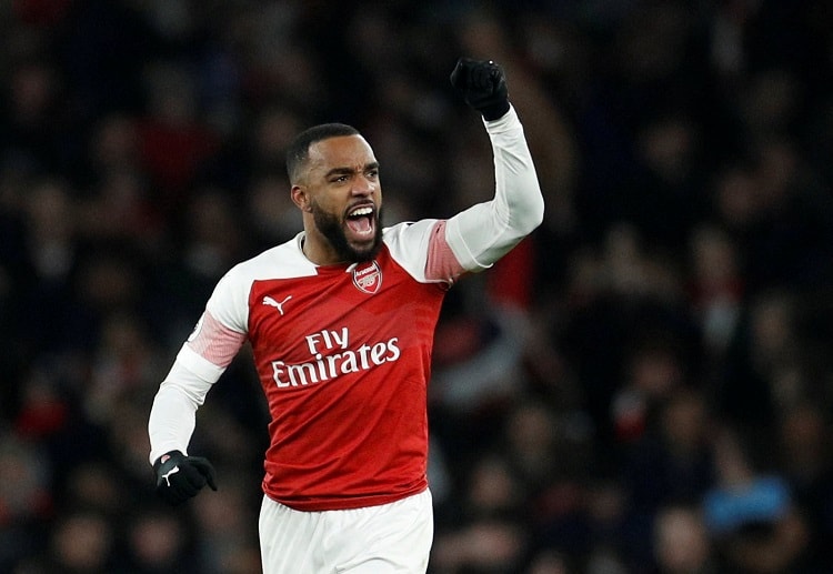 Alexandre Lacazette inspires his teammates in the first half in their Premier League clash against Chelsea