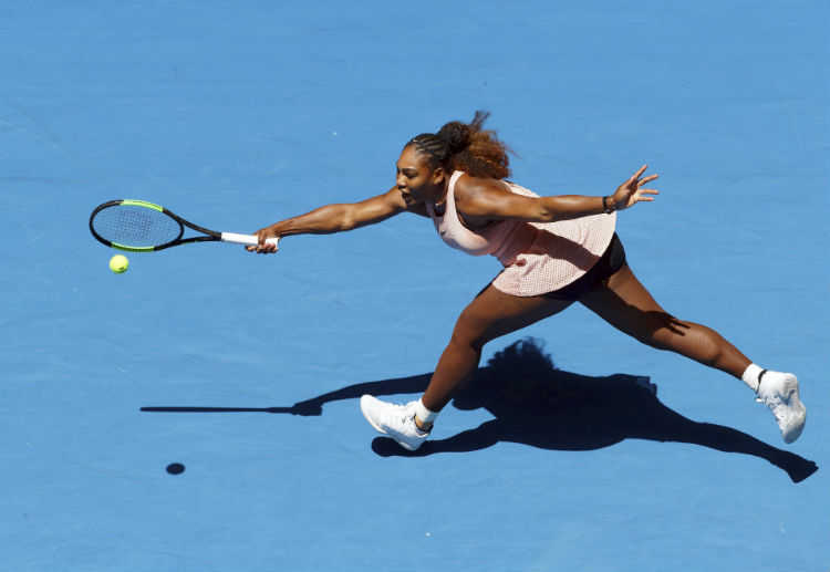 Serena Williams hits an ace during the match against Roger Federer in Hopman Cup mixed doubles