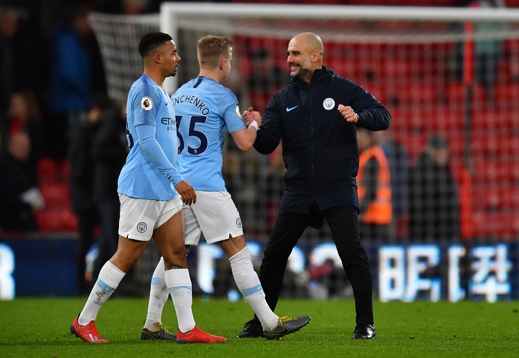 Pep Guardiola celebrates after Manchester City won over Bournemouth in Premier League Matchday 29