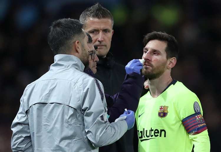 Barcelona Lionel Messi sidelined by Manchester United Chris Smalling and recieves broken nose injury in Champions League QUarter Final match