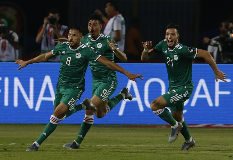 Youcef Belaili fires Algeria into the last 16 of the Africa Cup of Nations with 1-0 victory over Senegal