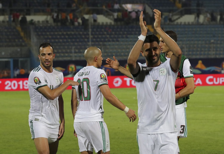 Riyad Mahrez scored as Algeria moved level with Senegal at the top of Africa Cup of Nations Group C