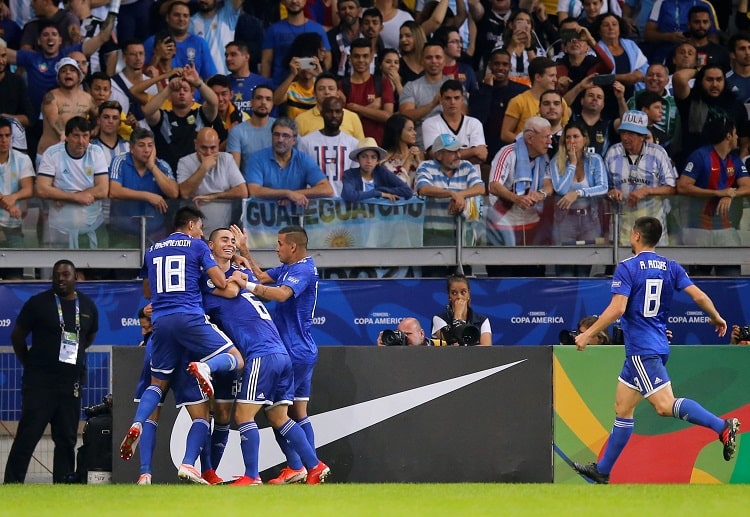 Paraguay players celebrate after Richard Sanchez hit an early goal during their Copa America game against Argentina