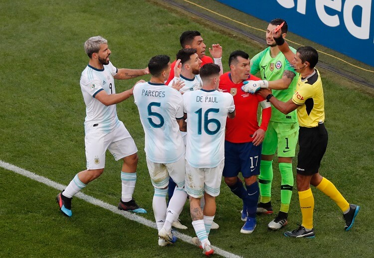 Lionel Messi receives a red card following a controversial call in Argentina's recent Copa America game