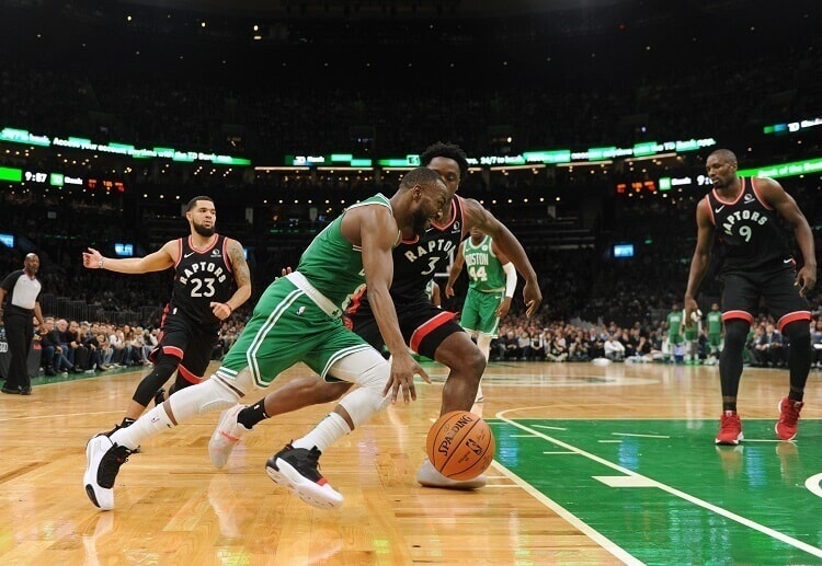 Led by Kemba Walker, the Boston Celtics defeated the Toronto Raptors to claim their first NBA win