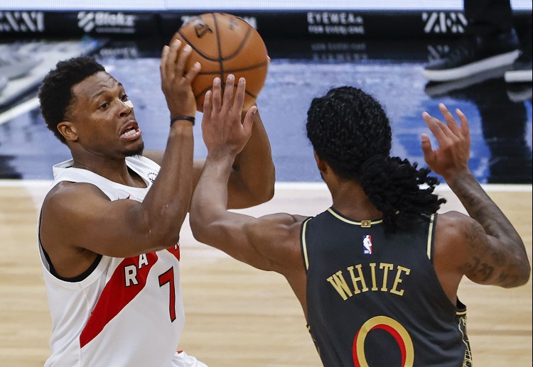 Toronto Raptors guard Kyle Lowry trying to shoot the ball during the NBA match