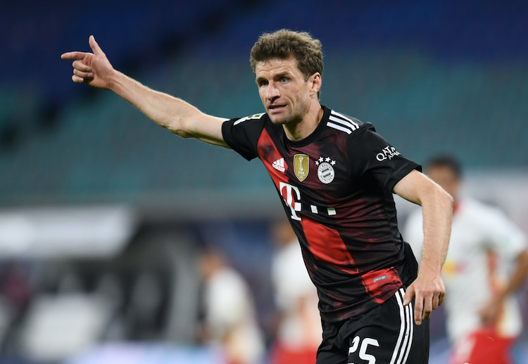 Thomas Muller prepares to lead Bayern Munich in beating PSG to advance to the Champions League semi-finals