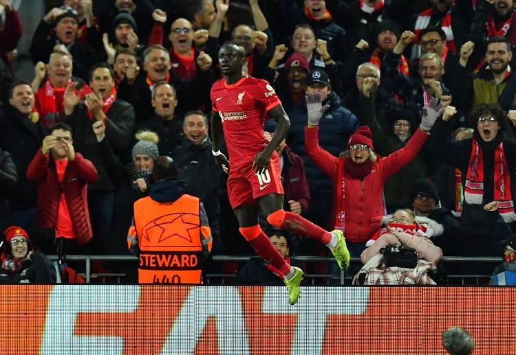 Sadio Mane sends Liverpool into the Champions League knockouts with a 2-0 win over Atletico Madrid