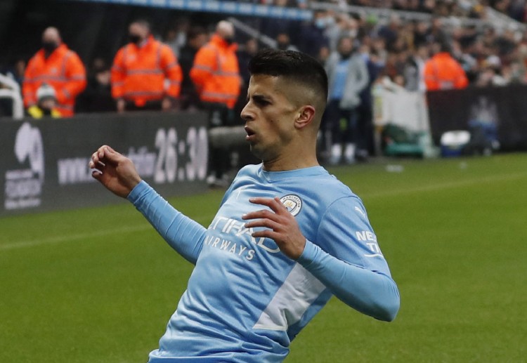 Manchester City's Joao Cancelo aims to score against Leicester City in the Premier League