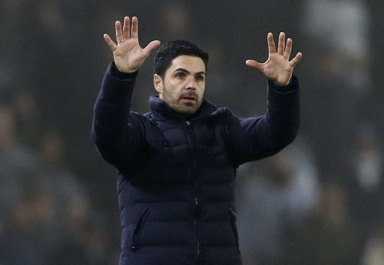 Arsenal manager Mikel Arteta instructs his players on the sideline during Premier League match against Leeds United