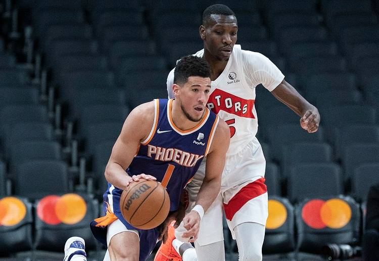 Devin Booker and co. keep their team at the summit after an NBA away win over the Toronto Raptors