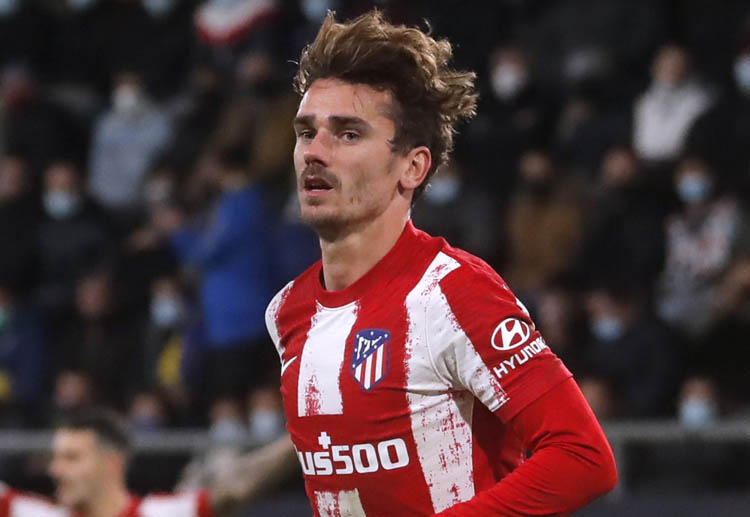 Atletico Madrid's Antoine Griezmann eyeing to score a Champions League goal against Manchester United