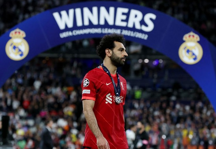 Mohamed Salah looks dejected following Liverpool's failure to win the Champions League title