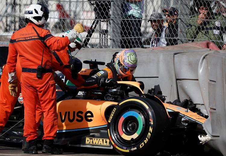 McLaren's Daniel Ricciardo gets out of his car after crashing during the Monaco Grand Prix free practice sessions