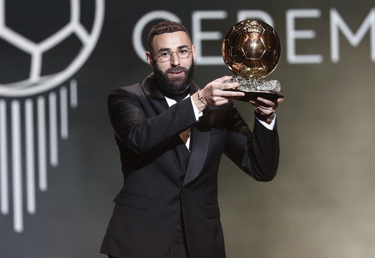 Karim Benzema claims his first golden ball award during the 2022 Ballon d'Or ceremony