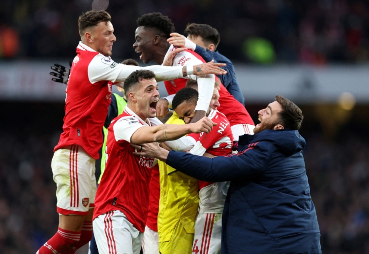 Arsenal celebrate gaining three points after they defeated Bournemouth in the Premier League at home