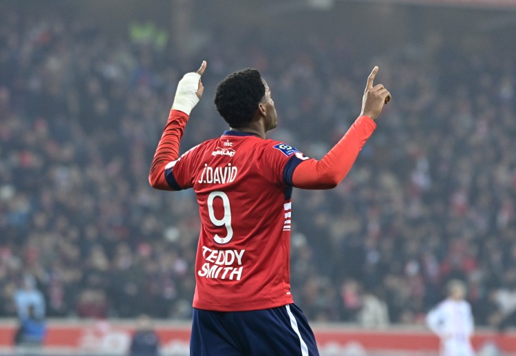 Jonathan David celebrates after scoring his third goal vs Lyon in Ligue 1
