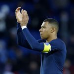 Where is Kylian Mbappe's final destination before the new Ligue 1 season starts?