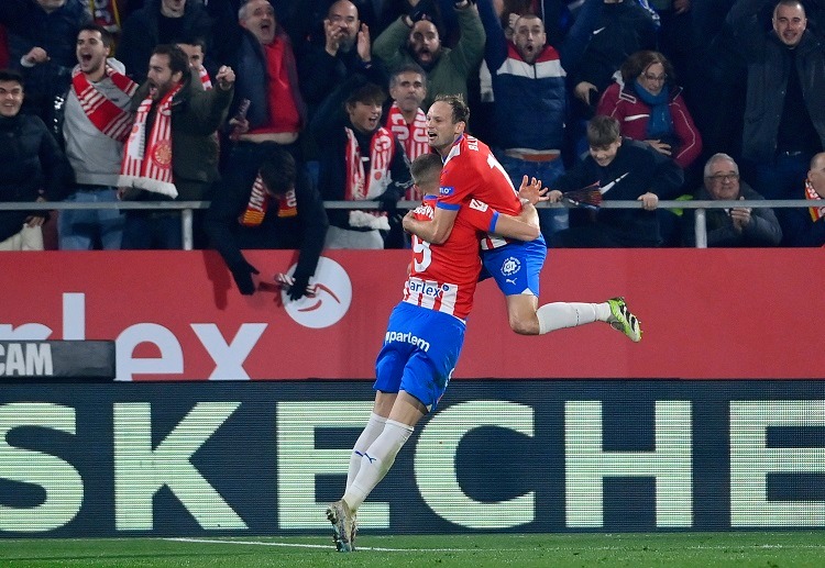 Daley Blind and Artem Dovbyk celebrated Girona's third goal in their La Liga match against Atletico Madrid